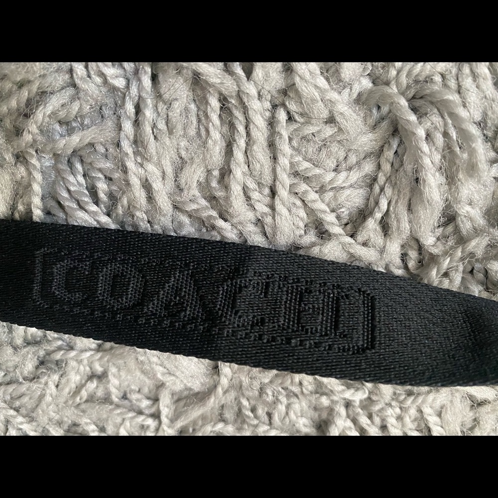 Coach crossbody strap.